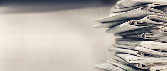 Pile of newspapers on white background - obrazy, fototapety, plakaty