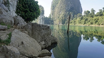tropical landscape on chiao lan lake in khao sok