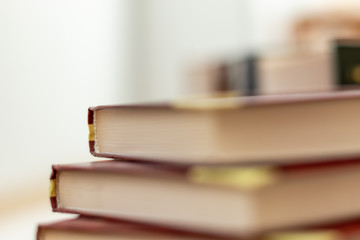 Stack of varied books many books piles