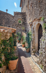 Fototapeta na wymiar Impression of the narrow streets in the old center of the picturesque medieval French village of Eze