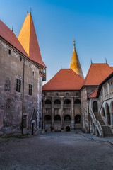 Inner courtyard of Corvin Castle or Hunedoara Castle in Transylvania, Romania. Built in Gothic and Renaissance style is one of the largest in Europe.