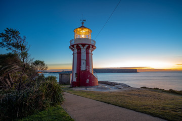 lighthouse on coast of sea