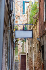 Fototapeta na wymiar Traditional little street in Venice, Italy