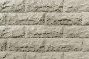 Old grey brick wall background texture
