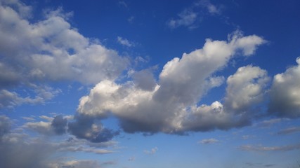 Naklejka na ściany i meble Blue sky. White clouds. Nature. Desktop. Landscape. Wallpapers