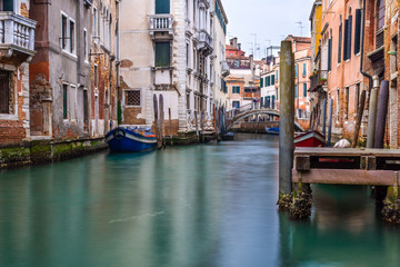 Naklejka na ściany i meble Traditional canal street in Venice, Italy
