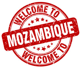 welcome to Mozambique red round vintage stamp