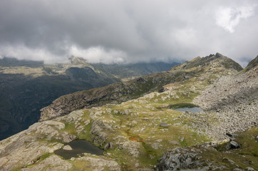 Fototapeta na wymiar View to valley Bors from mountain slope with litile pond , Alagna Valsesia area, Italy
