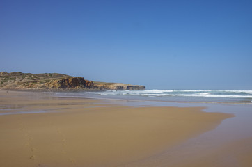 A view of beautiful Bordeira beach, famous surfing place in Algarve region, Portugal