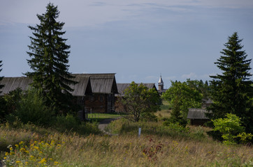 Fototapeta na wymiar Historical wooden peasant houses, Kizhi, UNESCO world heritage site, Onega lake, Karelia, Russian north-west.