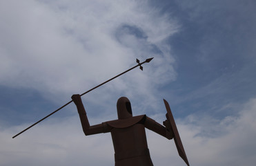 Archer sculpture with his arrow to the sky