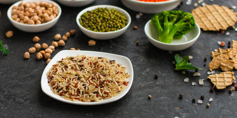 wild rice, healthy food concept (legumes, rice, micro greens and others) superfood. Food background