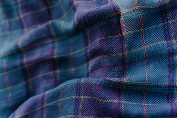 purple-blue blanket with karo pattern