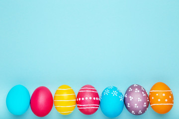 Colorful easter eggs on blue background