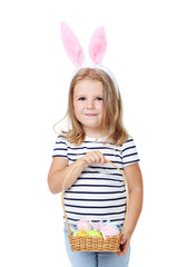Beautiful girl with rabbit ears and easter eggs isolated on white background