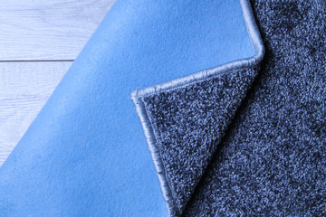 Gray carpet with stitched edges