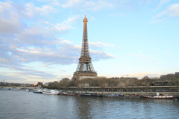 Fototapeta na wymiar Beautiful sky over the Eiffel tower and river seine, Paris capital and the most populous city of France