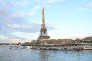 Fototapeta premium Beautiful sky over the Eiffel tower and river seine, Paris capital and the most populous city of France