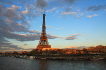 Beautiful sky over the Eiffel tower and river seine, Paris capital and the most populous city of France