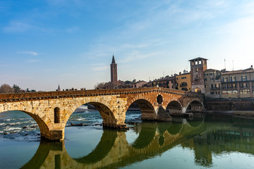 Naklejka premium Panoramic view of Ponte Pietra bridge in Verona on Adige river, Veneto region, Italy