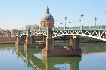 The Saint Pierre bridge passes over the Garonne river and Hospital de La Grave in Toulouse, Haute Garonne, Occitanie, France