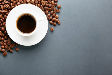 Scattered coffee beans frame design on copy space background.