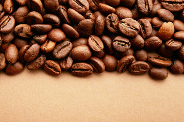 Scattered coffee beans frame design on copy space background.