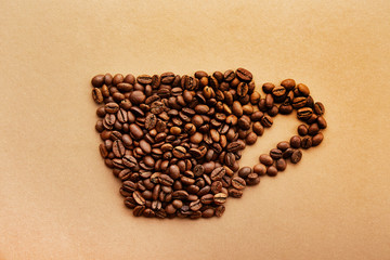 Scattered coffee beans frame design on copy space background.