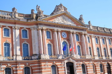 Fototapeta na wymiar The Capitole in Toulouse, the heart of the pink french city. It is an imposing building and is both the town hall and the Capitole Theatre, France