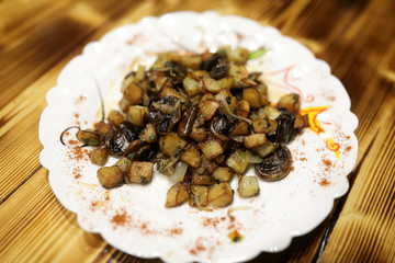Fried potatoes with mushrooms