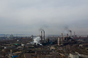 Polluting plant shot from above with a drone