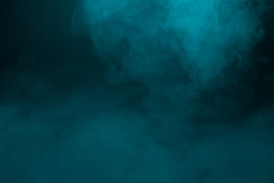 Colorful smoke close-up on a black background