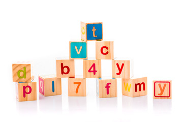 Toy cubes. Baby collection. ABC letters made from baby toys