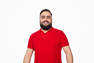 Fototapeta premium Cheerful ethic man looking at camera