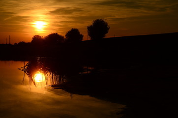 Obraz premium Sunset on the beach with beautiful sky