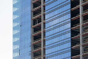 wall with window openings in a multi-storey high-rise residential building under construction from...