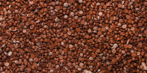 chocolate drops (sweets). food background. copy space. top