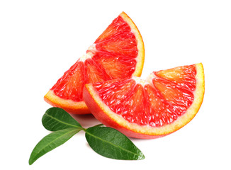 Slice of red blood orange with leaf isolated on white background