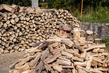 Large pile or stock of firewood for heating furnace