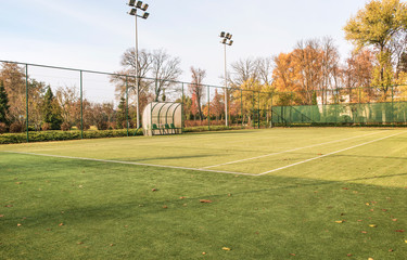 Tennis court in the landscaped park.