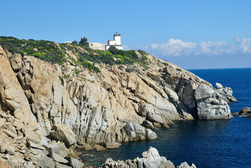 La costa ed il faro di Capo Ferrato
