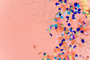 Top view of colorful party confetti background