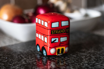 salt pepper shaker in the shape of a british double decker bus in the kitchen