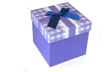 blue gift box with ribbon and bow isolated on white