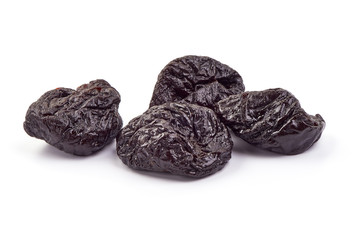 Fresh dry prunes, Dried sweet plums, close-up, isolated on white background