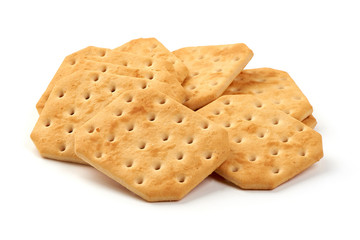 Salted cracker biscuits, close-up, isolated on white background