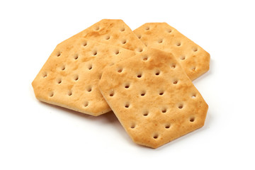 Healthy snack food, delicious salted crackers biscuits, close-up, isolated on white background