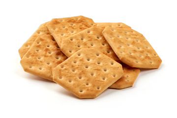 Salted cracker biscuits, close-up, isolated on white background