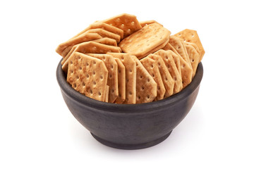 Healthy snack food, delicious salted crackers biscuits, close-up, isolated on white background
