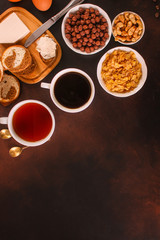 breakfas - cornflakes, coffee, jam, other ingredients. Top view. Copy space